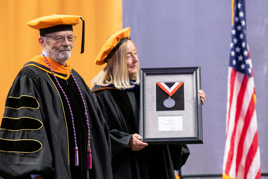 Presentation of the first ever President's medal to former cabinet member H. Robert Gill, Jr.