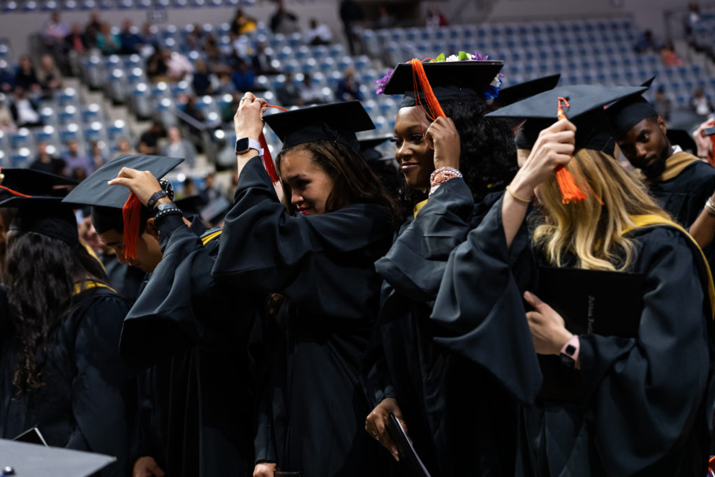 Graduating class moving their cap tassels during the commencement ceremony