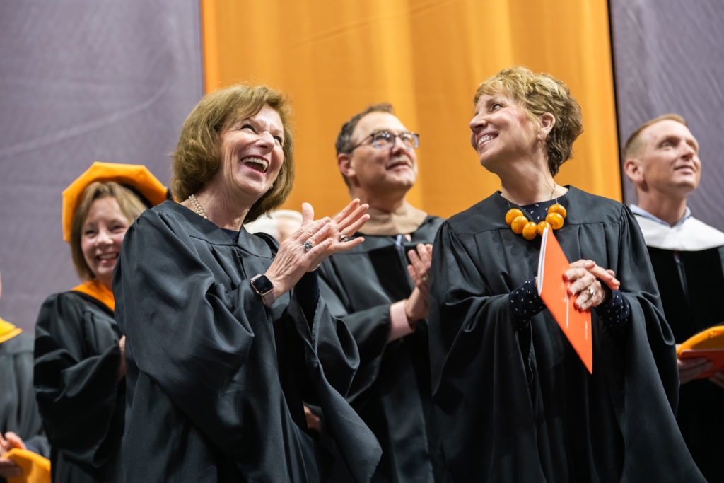 Pattie Hays and Rachel Tobin-Smith from AVOW sharing a funny moment at commencement