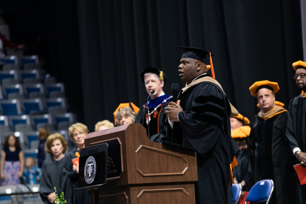 Darius singing the Alma Matter during the 2019 Commencement ceremony