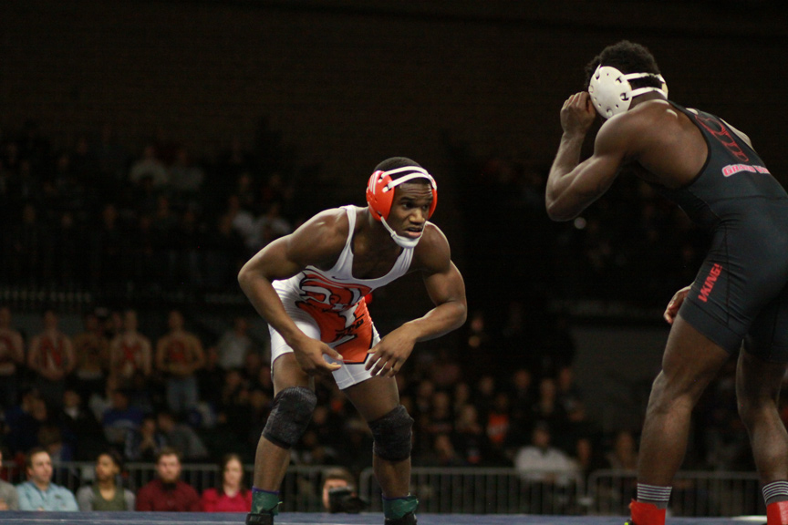 Indiana Tech's Erique Early squaring up with an opponent in a Men's Wrestling match