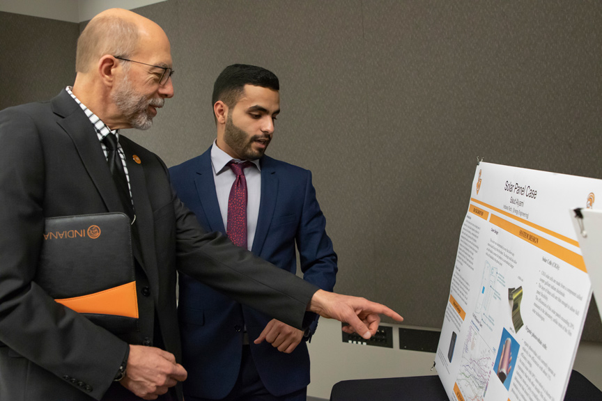 College of Engineering dean Dave Aschliman, left, discusses a project with Saud Alyami during the Showcase of Senior Projects and Technology.
