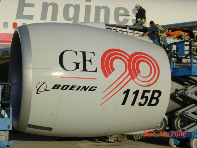 Members of Jan’s team install a 115B engine on a GE test aircraft in 2002. The advent of this engine propelled the growth version of Boeing's 777-300ER aircraft.