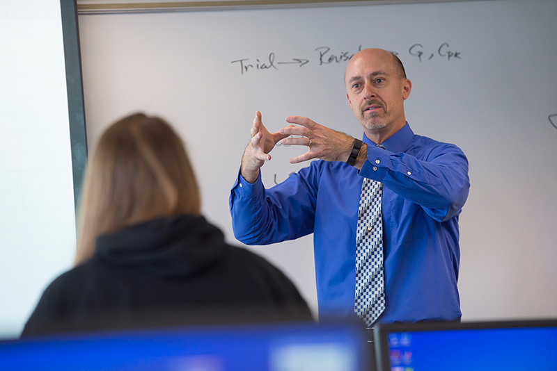 Dr. Steve Dusseau, professor of industrial and manufacturing engineering, leading a class at Indiana Tech