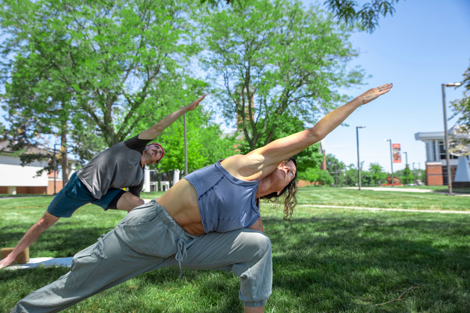 Mary Newell teaching yoga on campus
