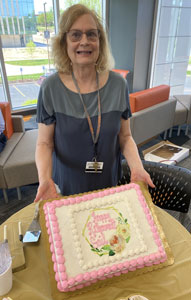 Gail Amstuts with retirement cake